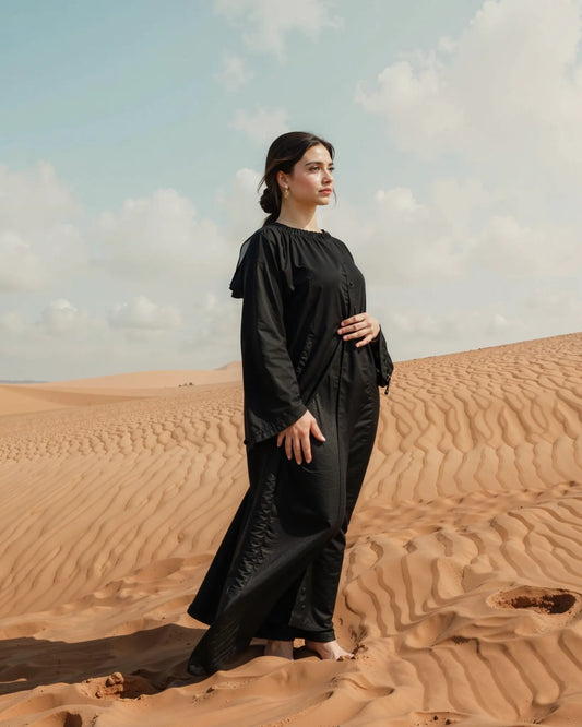 The "Onyx Blossom" Abaya – Classic Black with Intricate Detailing